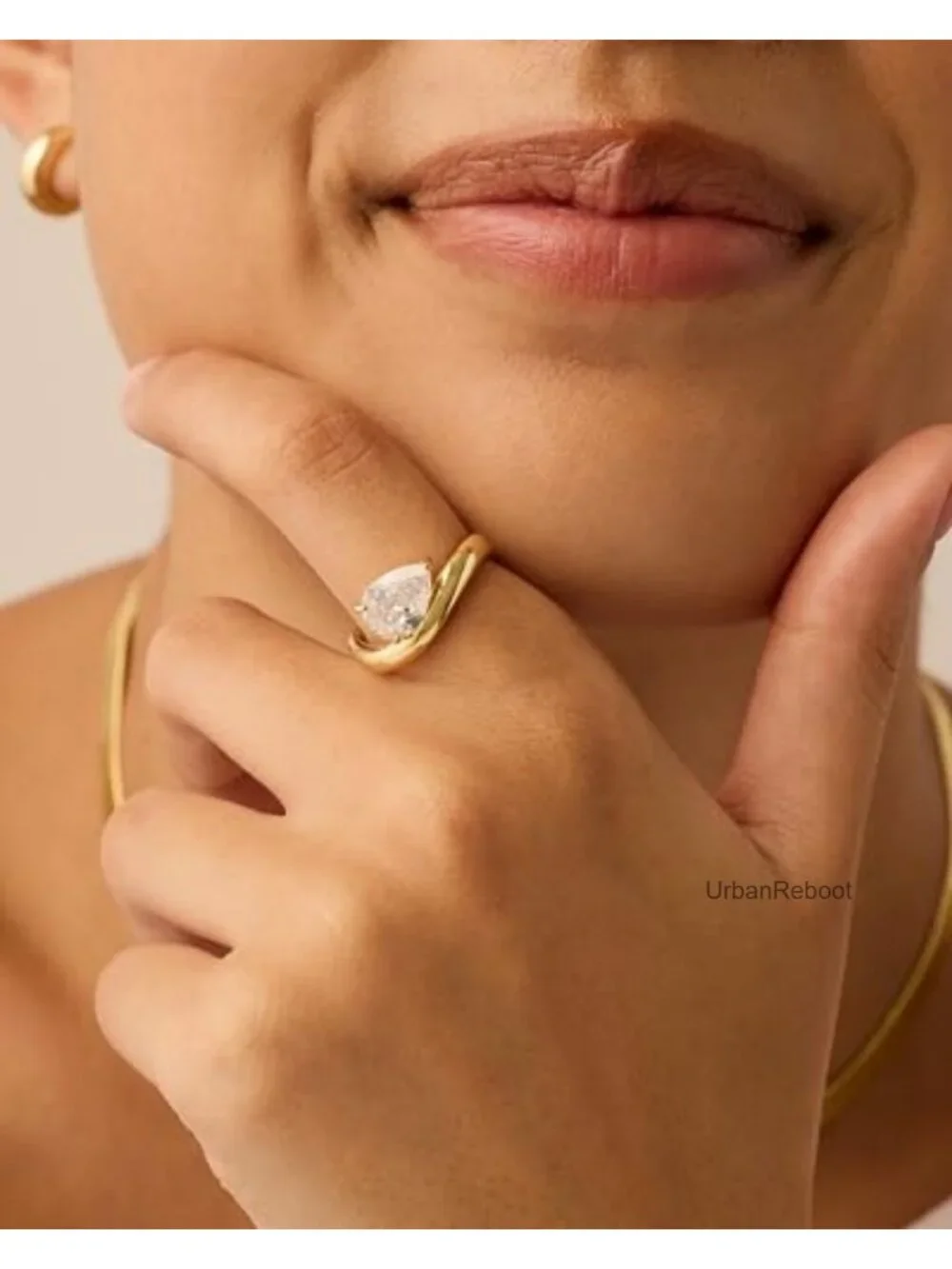 14K Gold Plated Wavy Engagement Ring with Pear Cubic Zirconia Solitaire